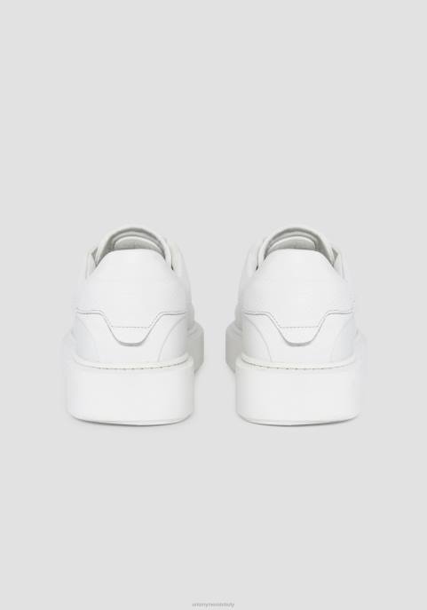 Antony Morato mężczyźni Artem niskie tenisówki ze 100% skóry w jednolitym kolorze z plakietką z logo VNLT297 obuwie biały