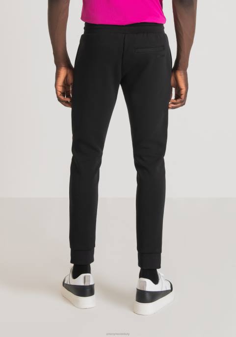 Antony Morato mężczyźni spodnie o bardzo dopasowanym kroju z mieszanki bawełny z kontrastowym nylonowym shioze VNLT238 odzież czarny